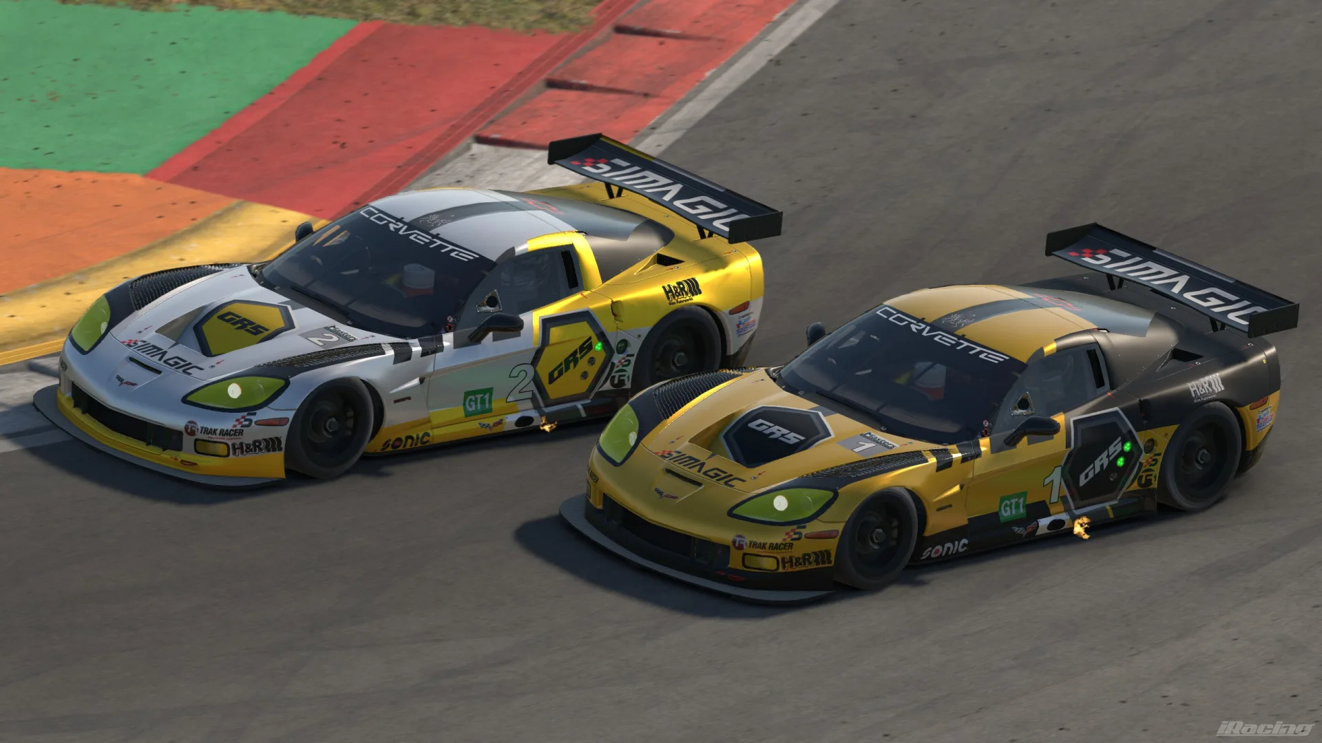 Two Project GRS Corvette GT1 endurance cars racing side by side