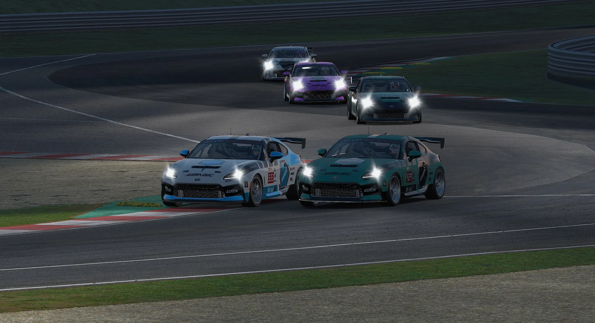Project GRS Toyota GR86 field racing together at night